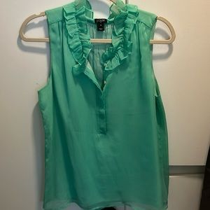 J Crew Sleeveless Blouse never worn.
